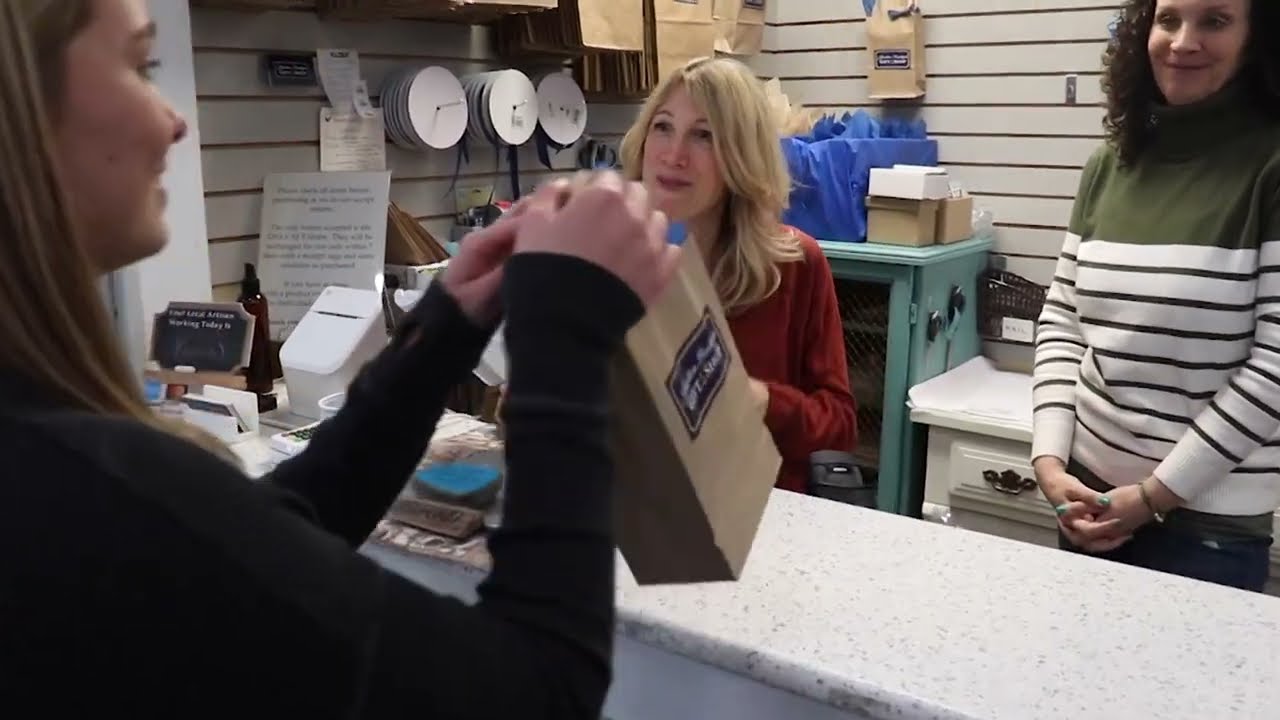 Chris Slater inside Junction Boutique, talking about the shop and its Jersey artisans